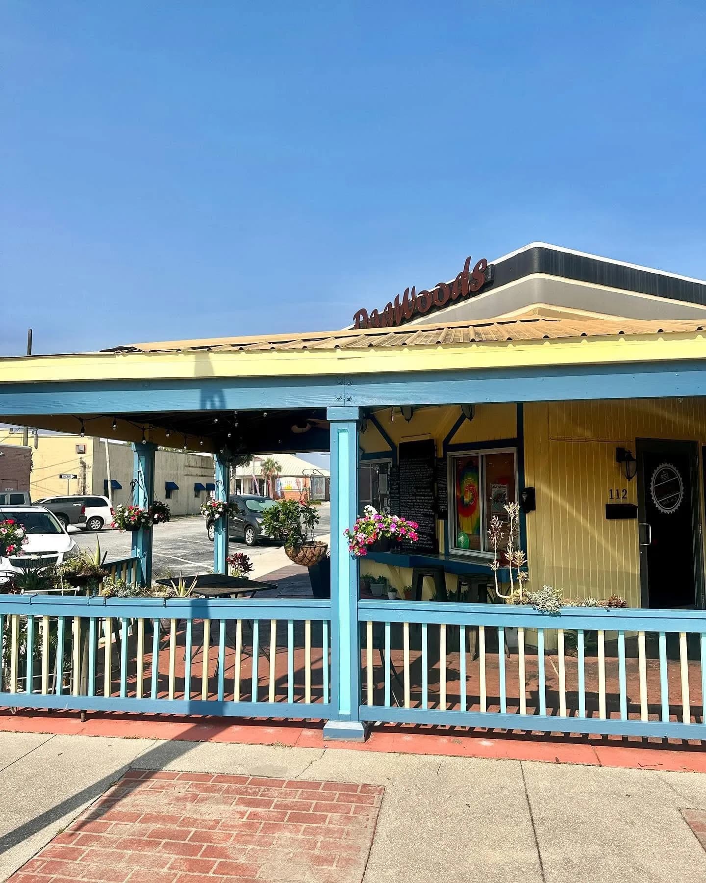 The blue and yellow porch at Dagwood's on Reid Ave